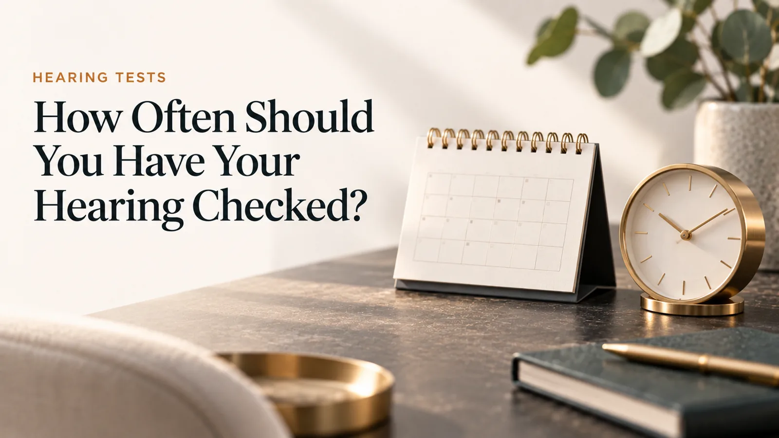 A minimal gold desk calendar and clock suggesting a regular check-up.