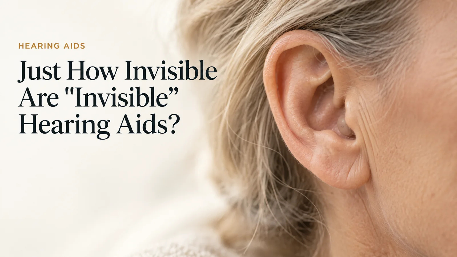 An extreme close-up of an ear with a nearly invisible in-canal hearing aid.