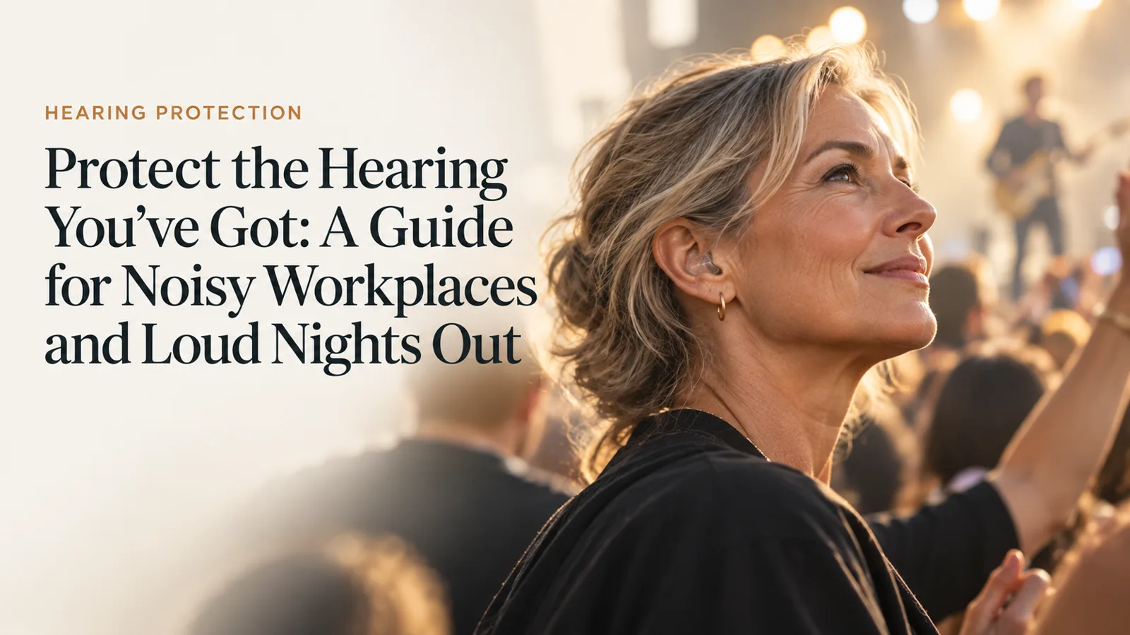 An adult at a loud event wearing discreet ear protection.
